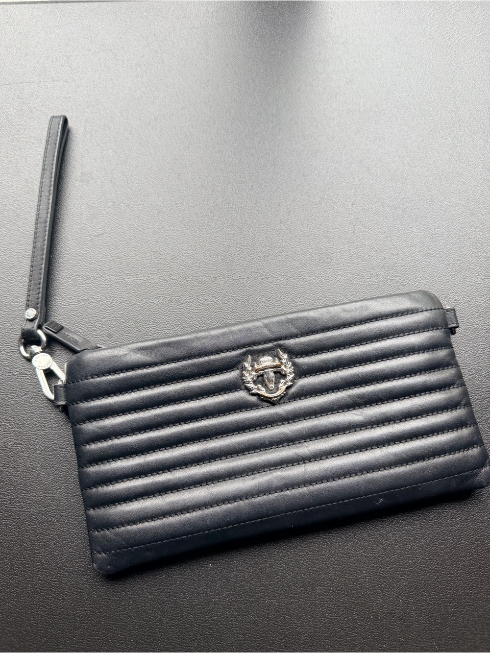 RUDSAK Black Quilted Leather Wristlet Clutch with Crest Emblem